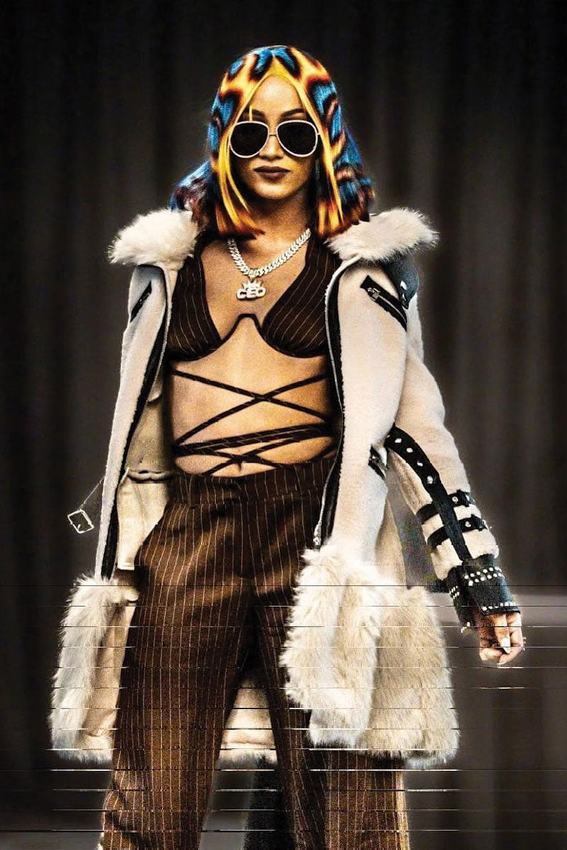 woman wearing a blue orange and yellow flame wig and sunglasses