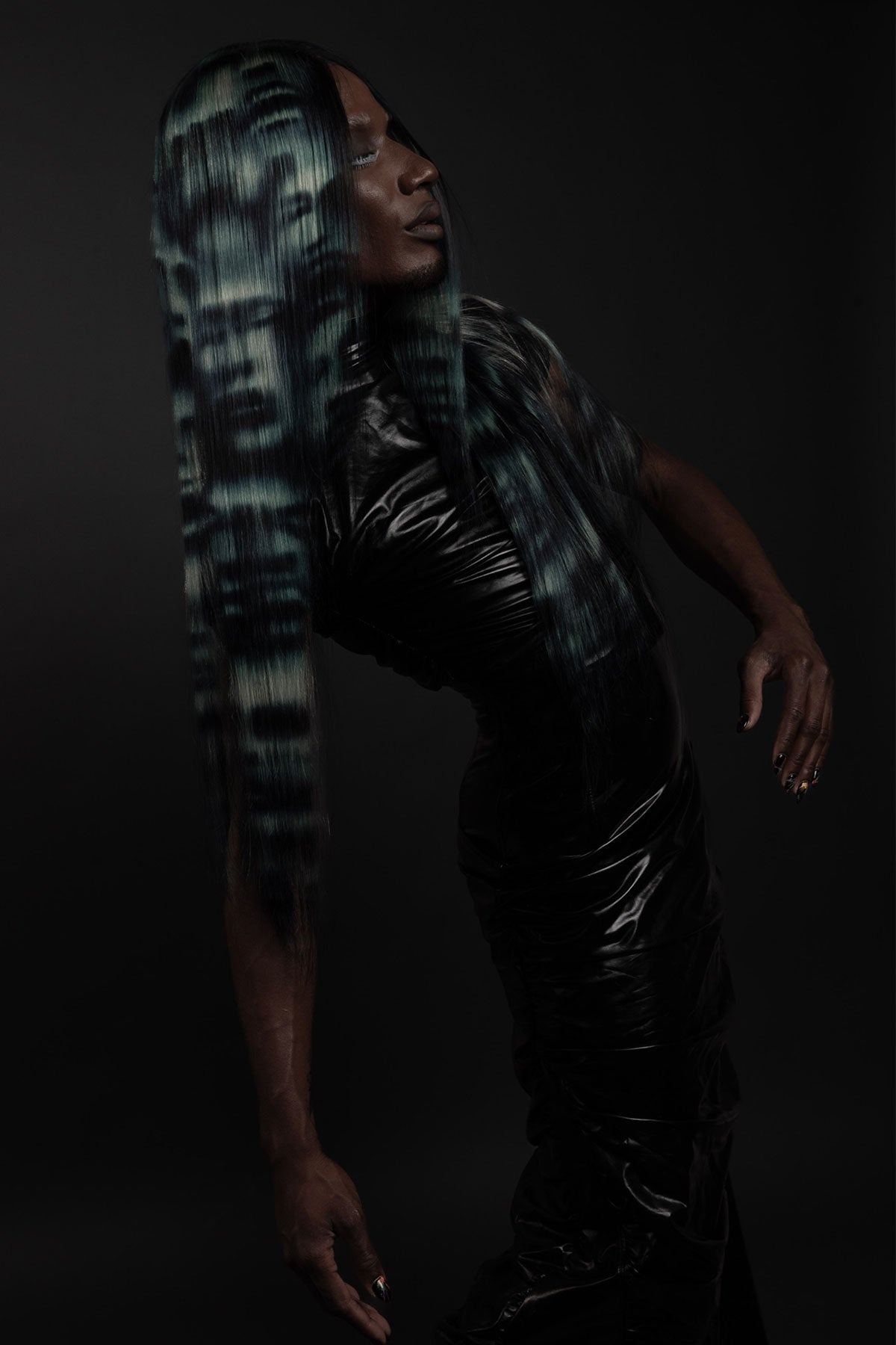 a front view of a model wearing a blue black and white ghost face wig